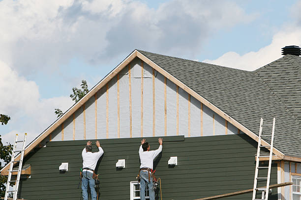 Professional Siding Replacement technician working in Clinton, OH